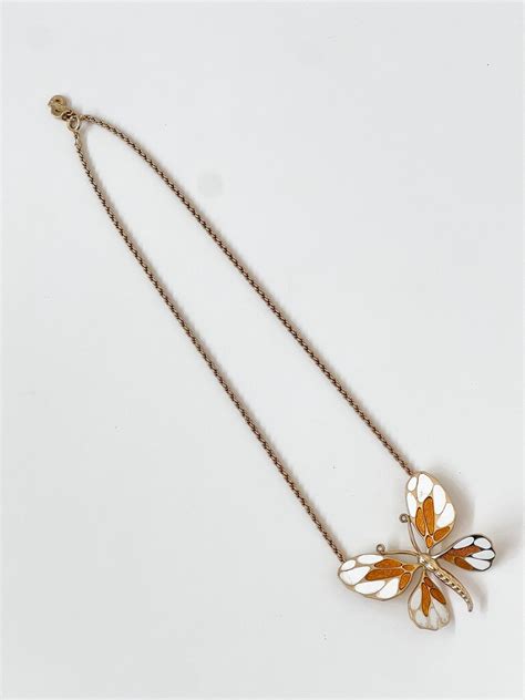 christian dior butterfly necklace.